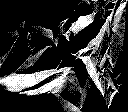 A close up of crumpled paper forming abscract shapes, taken in 2 bit black and white.